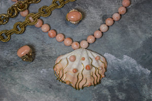 Shell pendant on pink Coral bead necklace